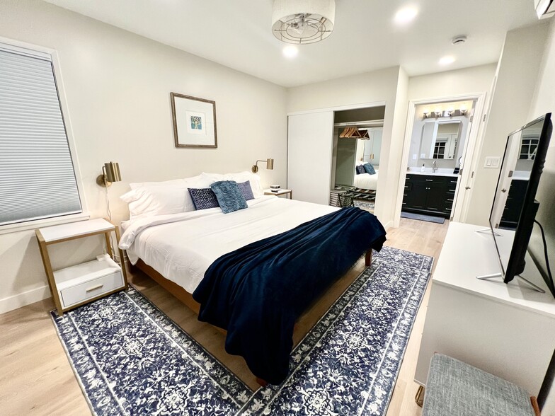 There's a nice-sized closet and dresser, plus an attached private bathroom. - 2824 S Orange Dr