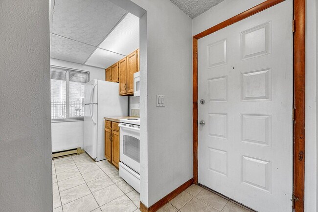 Building Photo - $1,245.95, 1 bed, 1 bath, garden level Condo with Washer/Dryer