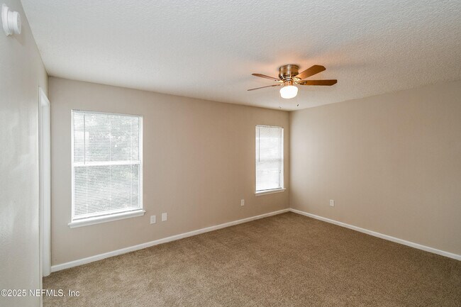 Building Photo - 9370 Jayhawk Ln
