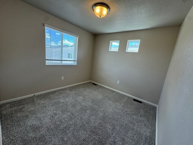 Building Photo - Modern 3-Level Home with Dual Balconies, Open Floor Plan & Bonus Flex Space