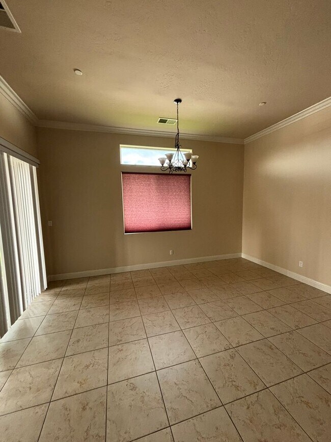 Building Photo - 4-Bedroom Home with 3-Car Garage, Office, Gated Community Pool & HOA Included