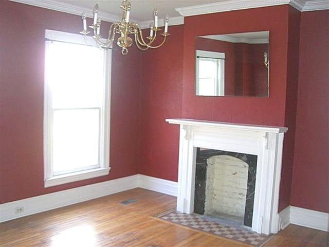 Dining Room with Chandelier and Fireplace Mantle - 1106 George St