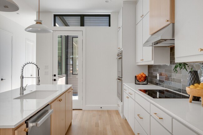 Building Photo - Newer-Construction Home in East Village — Private Yards & Flexible Spaces