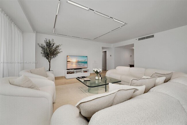 Building Photo - 10205 Collins Ave