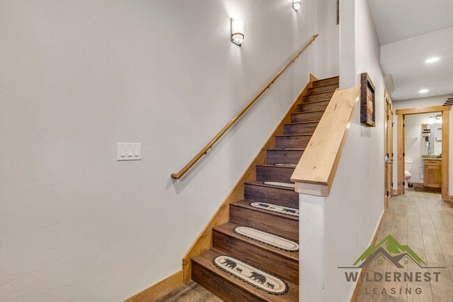 Building Photo - Beautiful Furnished Townhome with infared sauna, finished garage and community amenties