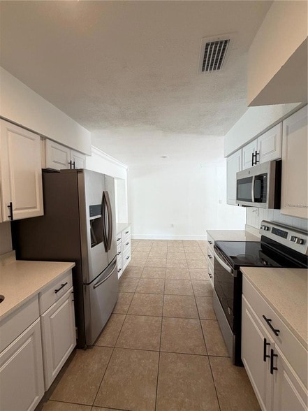 Building Photo - 1702 W Dempsey Ave