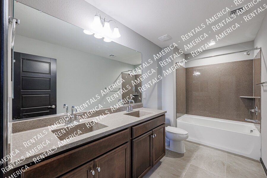 Building Photo - 5610 N 90th Dr