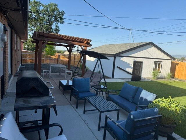 Backyard with pergola and detached 2car garage. - 7101 Clay St