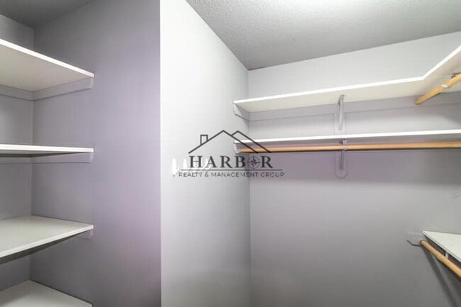 Building Photo - Updated 4 Bedroom Home with Remodeled Kitchen & Tiered Deck