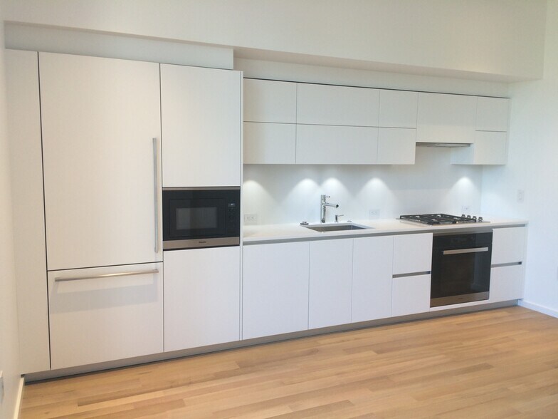 Pedini cabinets, quartz countertops, Miele appliances - 1275 NW 10th Ave