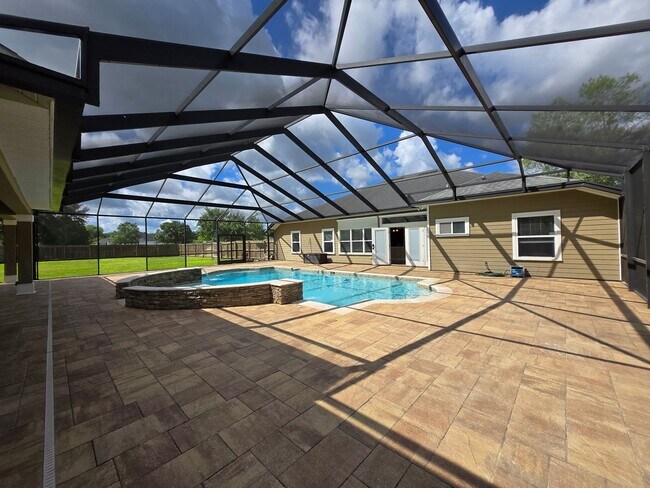 Building Photo - Gorgeous 4-Bedroom Home with Office, Pool,...