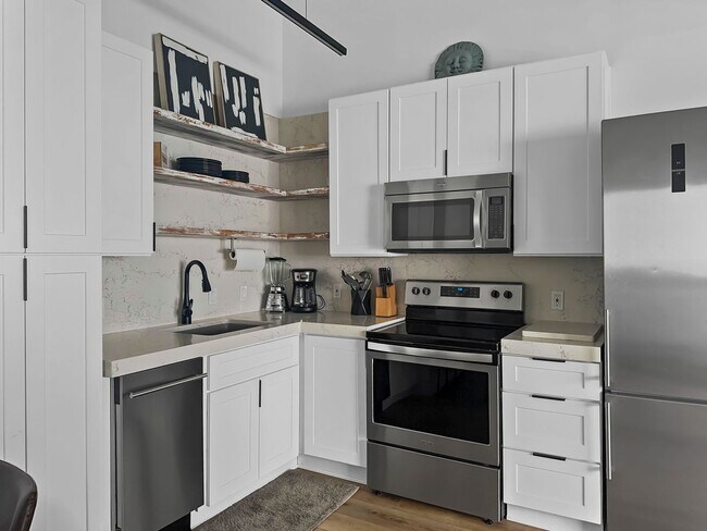 Building Photo - 50% off first months rent.  Gulf front com...