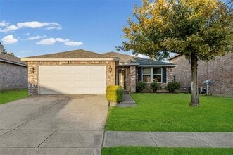 Building Photo - 8409 Redheart St