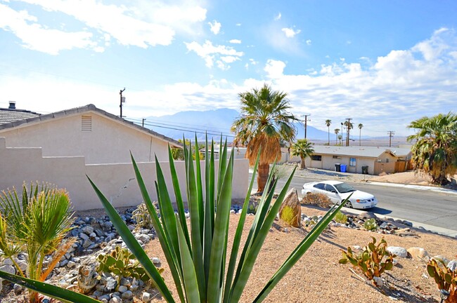 Building Photo - "Charming 3-Bed Oasis with Scenic Views & ...