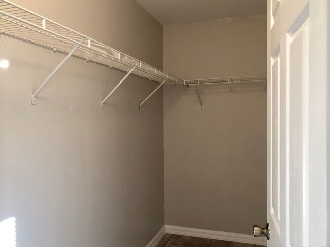 Building Photo - Experience this Large Cape Coral 3 bedroom 2 bath duplex with 1 car garage and screened in lanai.