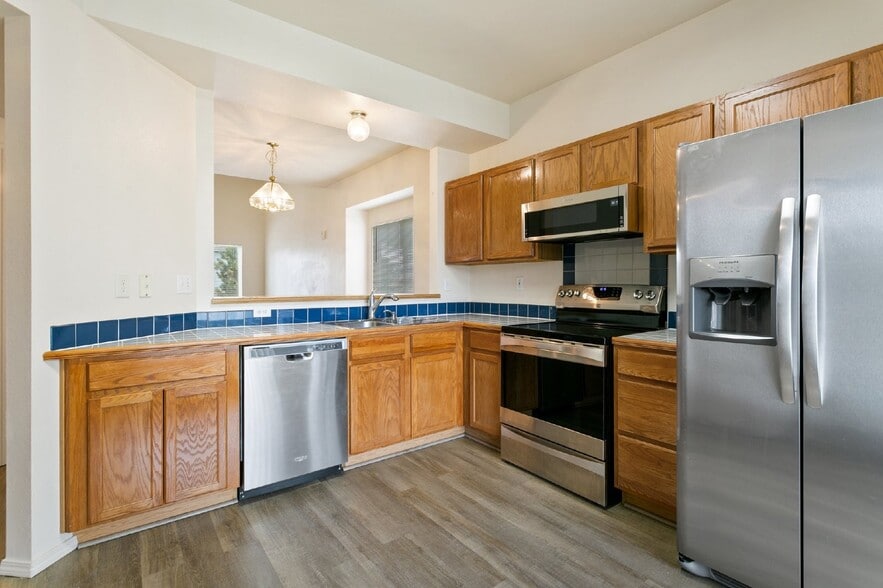 Building Photo - Spacious 4-Bedroom Home with Finished Base...