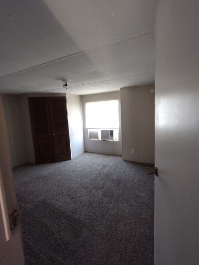 Building Photo - 3 Bedroom/2 Bath home on large fenced lot