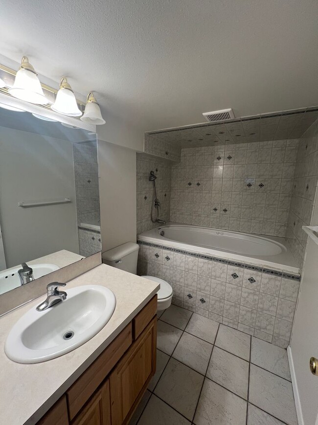 Building Photo - Non-Refundable & Security Deposit Total: $1400.00