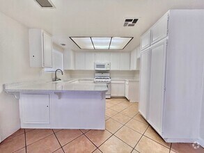 Building Photo - Updated 4-Bedroom, 2-Bath Home for Rent in...