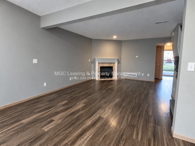 Building Photo - Inviting Harrisonville Townhome with Attached Garage & Cozy Fireplace