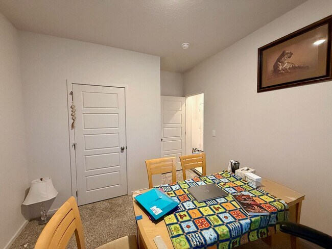 Building Photo - New Construction 4 Bed Mead School District Rancher w/ Fully-Fenced Yard and Attached Garage!