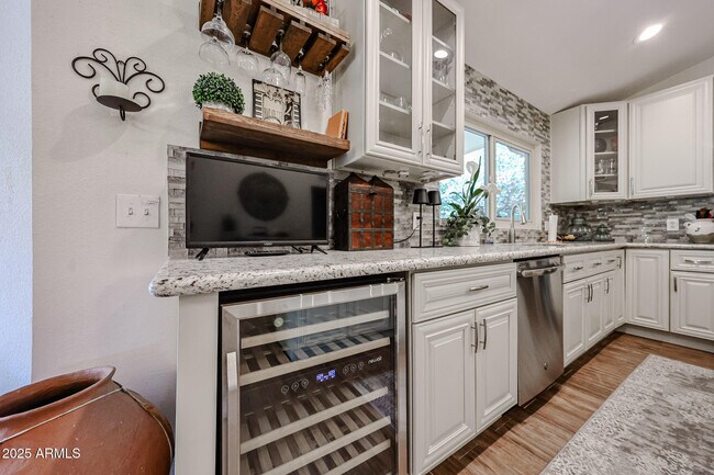 Building Photo - 9085 E Windrose Dr
