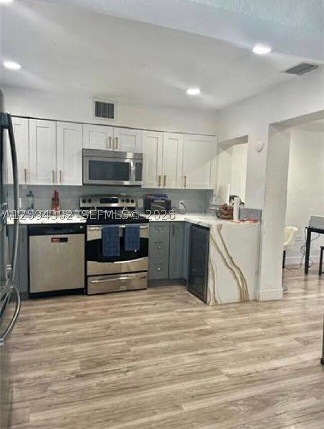 Building Photo - 12040 N Miami Ave