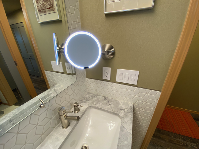 Bathroom with lighted vanity mirror - 3435 California Ave SW