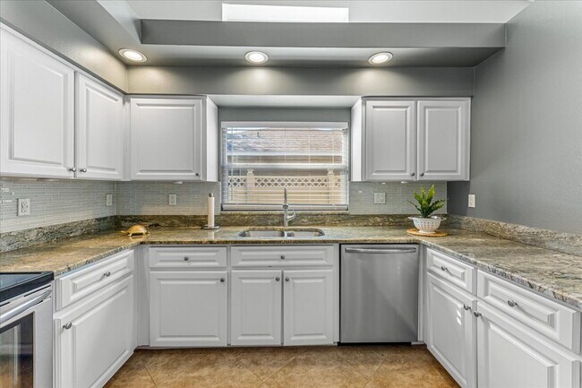Building Photo - A vibrant 2-bedroom, 2-bathroom tropical retreat designed for both high-energy entertaining and l...