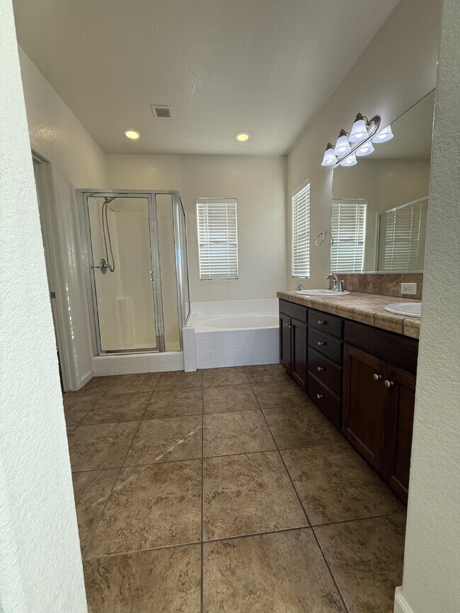 Building Photo - Reduced Price $2395 Per Month *PLUS $99 De...