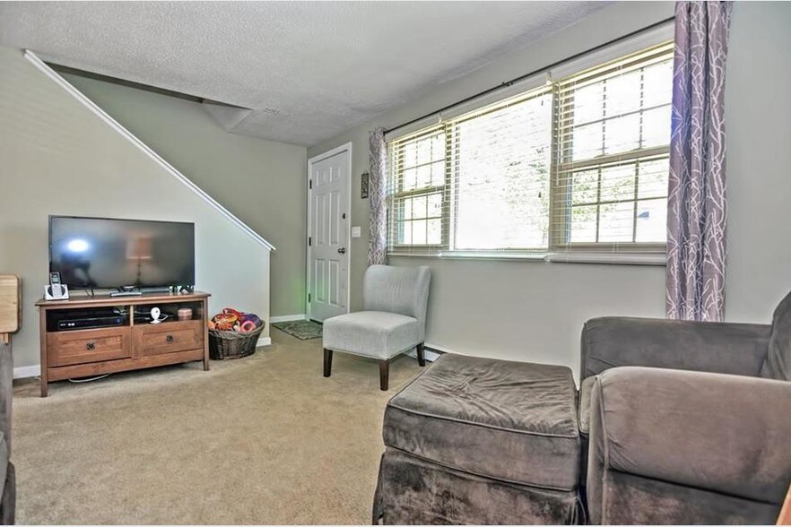 New flooring has been installed - see photos at end of listing - 98 Hayward St