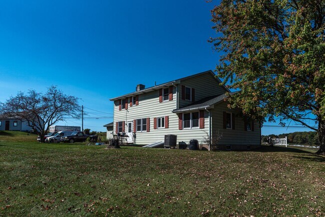 Building Photo - **Charming Colonial in Picturesque Lower Milford Township**