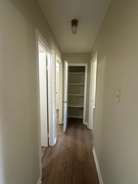 Linen closet on the end of both halls - 511 Harris Estate Dr