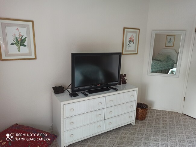 Guest bedroom with own TV - 106 Siena Way