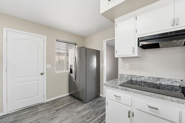 Building Photo - Comfortable 2-Bed Sun City Retreat with Vinyl Flooring & Fresh Paint