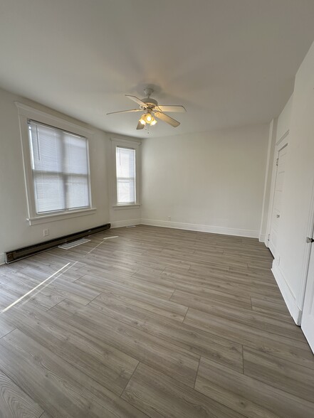 Large living space with abundant natural light. - 803 W Edwards St