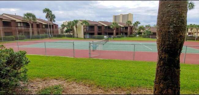 Building Photo - 2 BR and 2 Baths overlooking the Tennis Court