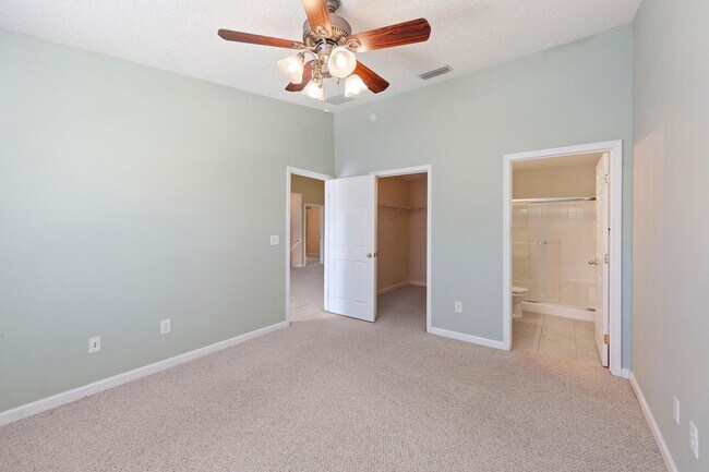 Building Photo - Beautifully Updated & Spacious 3BR/2BA Condo in a Secure Gated Community — Includes Cable, Intern...