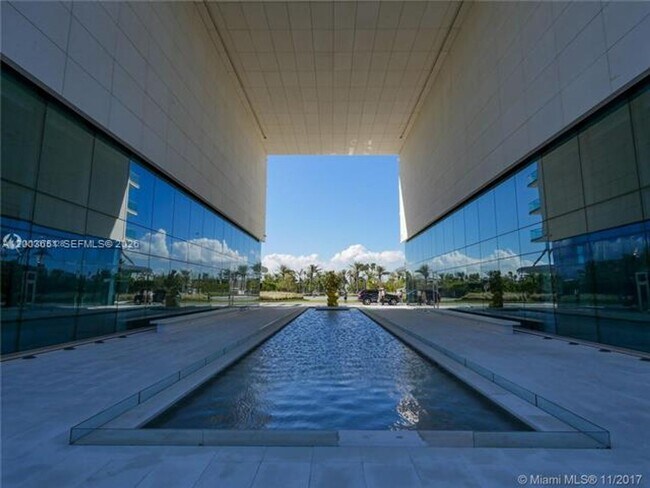 Building Photo - 10201 Collins Ave