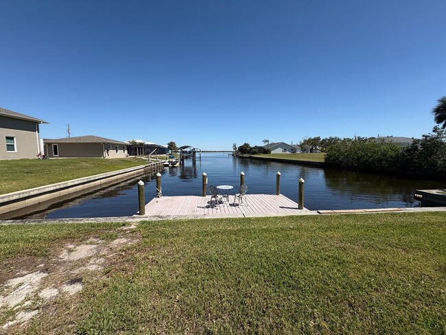 Building Photo - Sunsets & Serenity 2/2 Pool Home on a canal