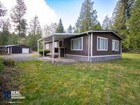 Building Photo - 2 Bed / 2 Bath Home with 4-Car Garage, Large Yard & RV Parking in Graham!