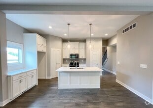 Building Photo - SEE IT NOW: Modern 3-Bedroom Townhome with...