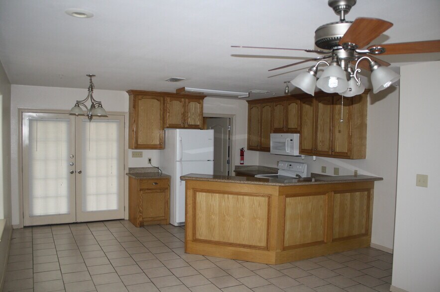 Inside looking at the kitchen area - 1204 West Kiwi