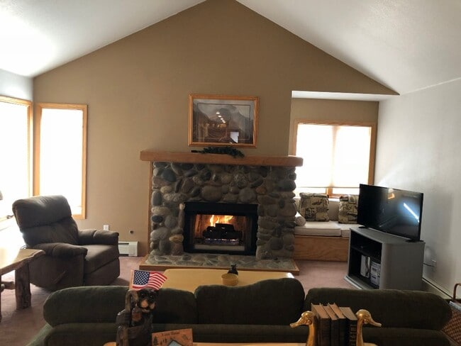 Building Photo - A quiet upstairs location with forest views