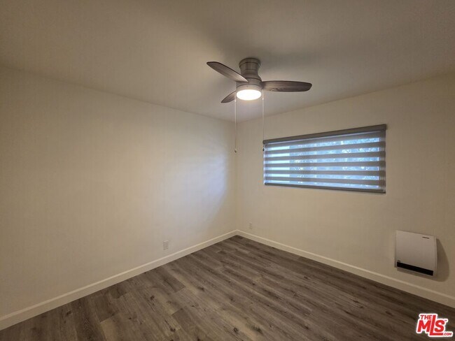 Building Photo - 10734 Palms Blvd