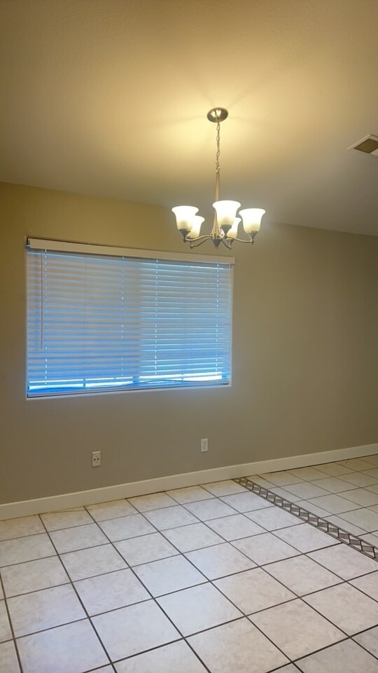 Building Photo - $2,000 For Rent A Lovely 3 Bed 2 Bath 1.673 Sq. Ft. Condo, all One Level Home in Chandler 85225!