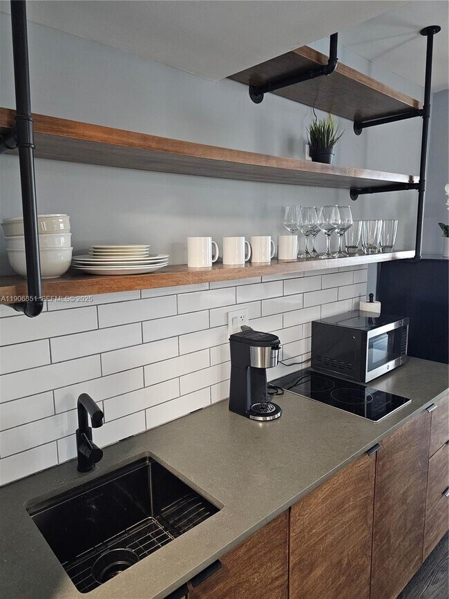 Building Photo - 19201 Collins Ave