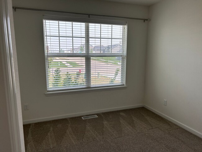 Building Photo - Available in August - Spacious 4 Bedroom, 3 Bathroom Home in the Linn-Mar School District