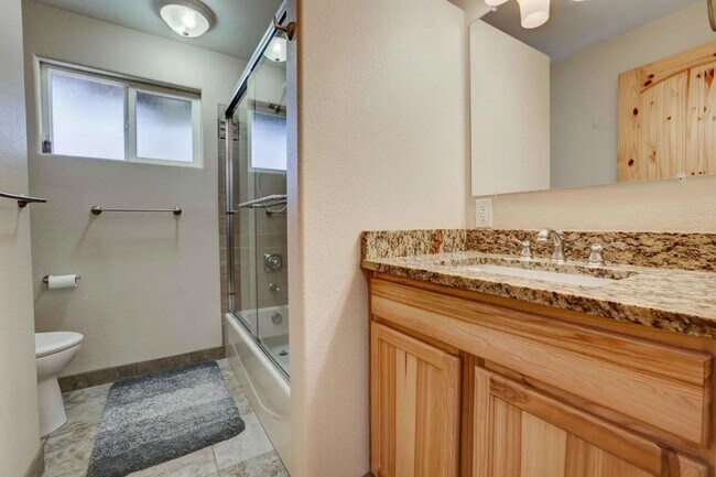 Building Photo - 1/2 acre in the with RV Hook ups