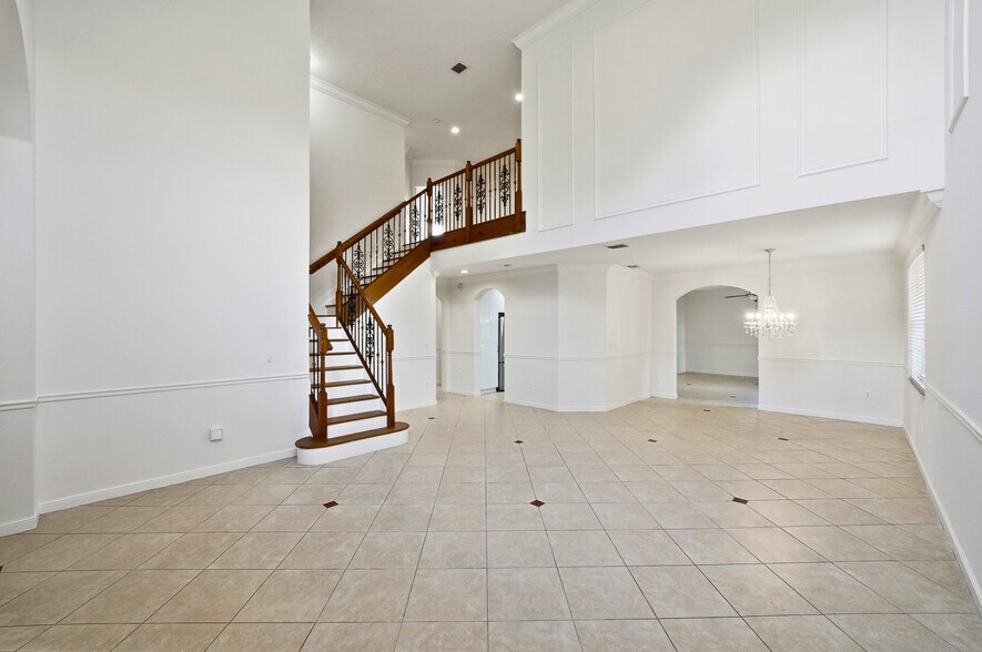 Elegant Staircase with Wood & Iron - 2388 SW 127th Ave